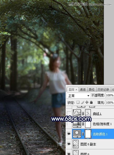 PS调色调出唯美蓝色逆光效果的树下美女照片